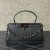 Valentino Garavani Rockstud handbag in calfskin.