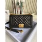 Medium Boy Chanel Handbag  in grained calfskin 